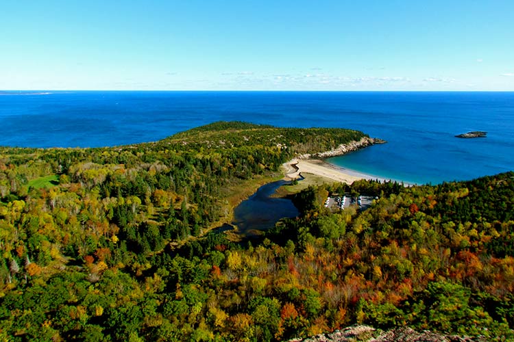 An aerial view of Maine's stunning Arcadia National Park. Image by Jeff Gunn / CC BY 2.0.