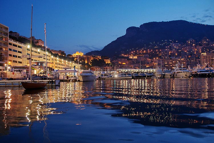 The harbour of Monaco at night. Image by Adomas Svirskas / CC BY-SA 2.0. 