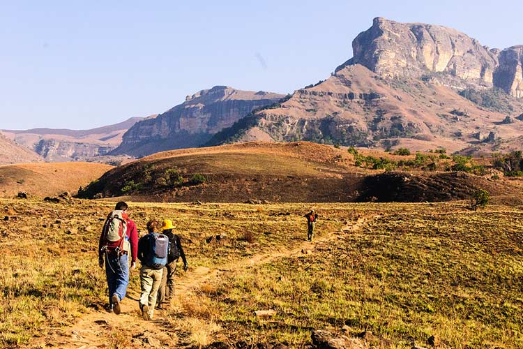 Hikers heading into the Drakensberg Range. Image by billandkent. CC BY 2.0.