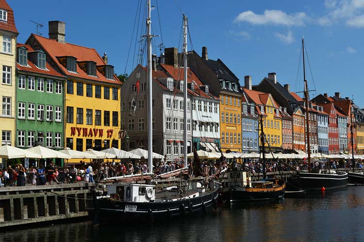 The lively quayside streets of Copenhagen. Image by Pug Girl. CC BY 2.0.
