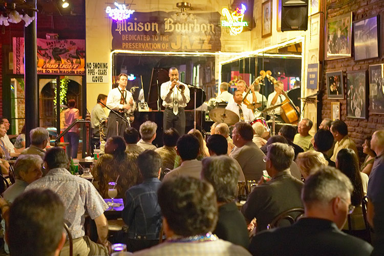 A band playing at the Maison Bourbon Jazz Club in New Orleans. Image by VisionsofAmerica/Joe Sohm / Getty Images.