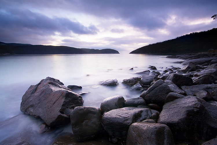 The sunrise seen from Fortesque Bay, Tasmania, by JJ Harrison. CC BY 2.0.