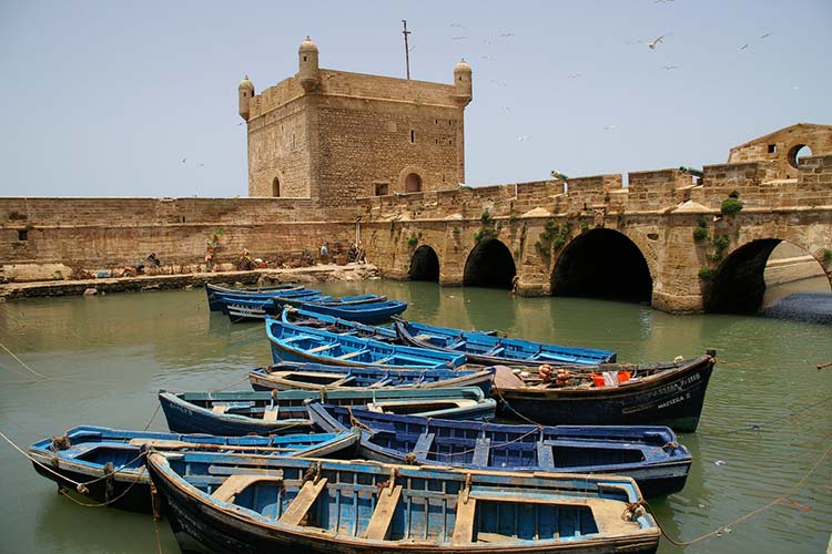 Fishing boats in the harbour of the atmospheric Moroccan city of Essaouira. Image by Jean-Marc Astesana / CC BY 2.0.