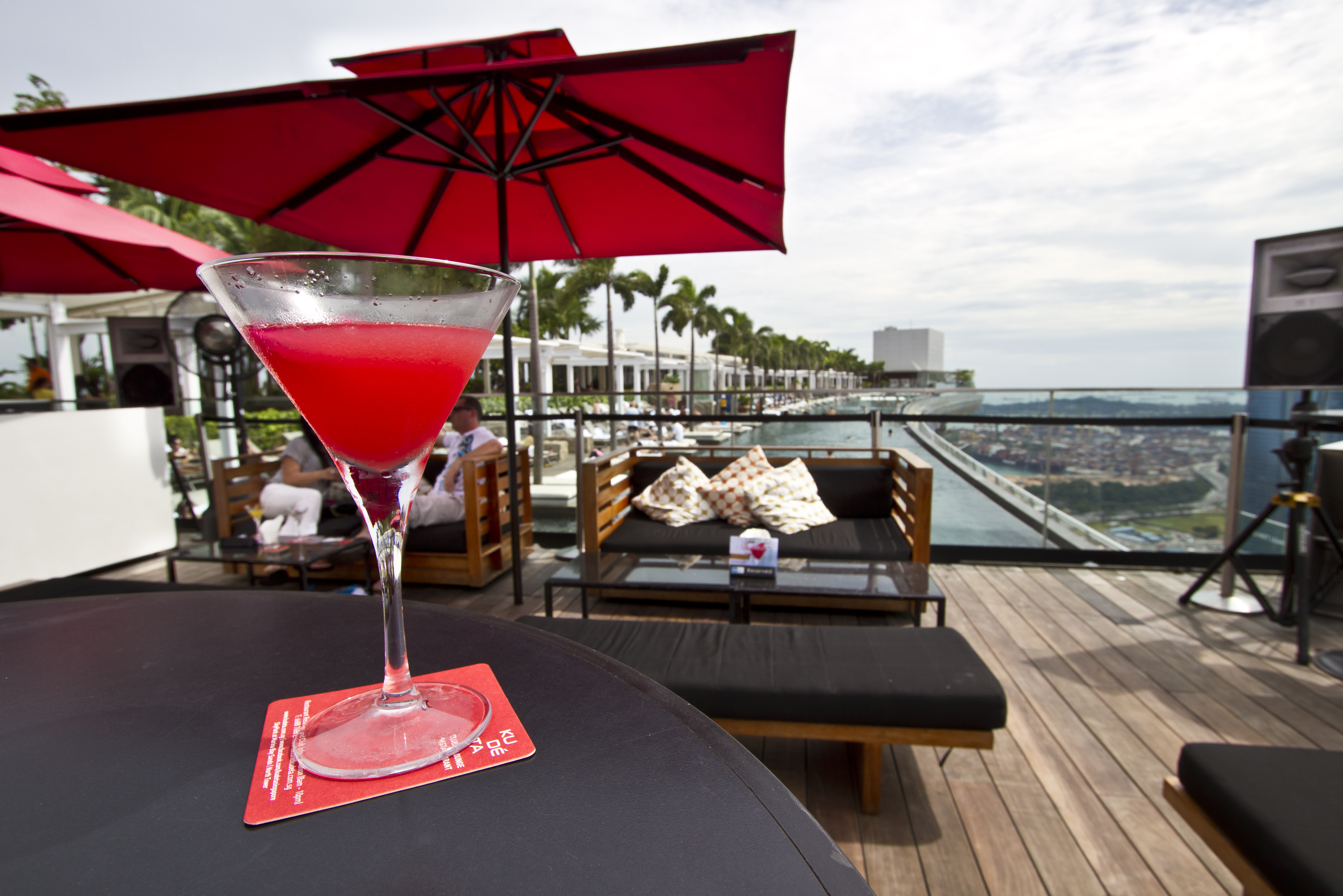 Sip a cocktail at Cé La Vie, perched on top of Singapore's iconic Marina Bay Sands Hotel. Image by Kylie McLaughlin / Lonely Planet Images / Getty Images