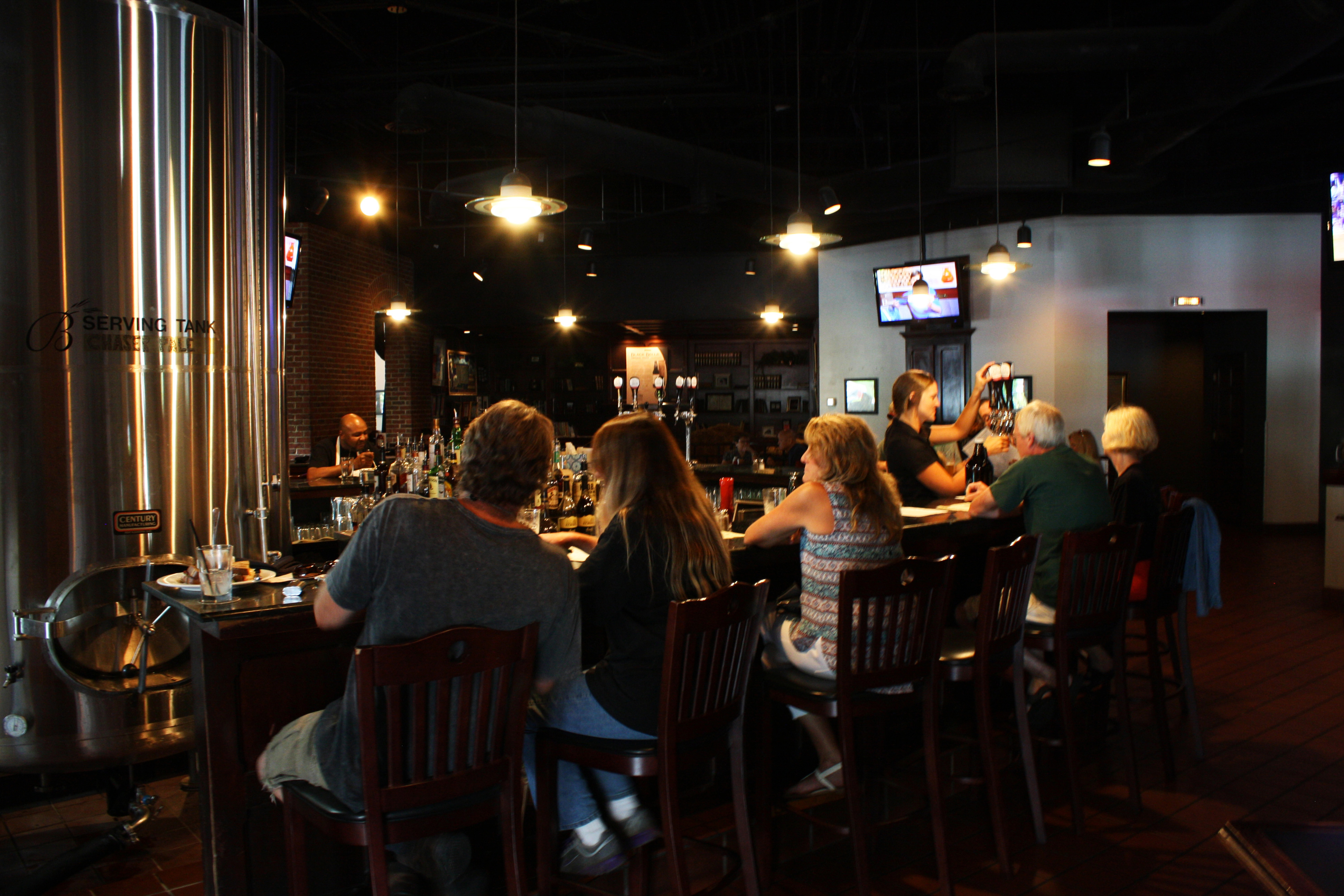 Grabbing a pint at Blackstone’s bar. Image by  / Lonely Planet