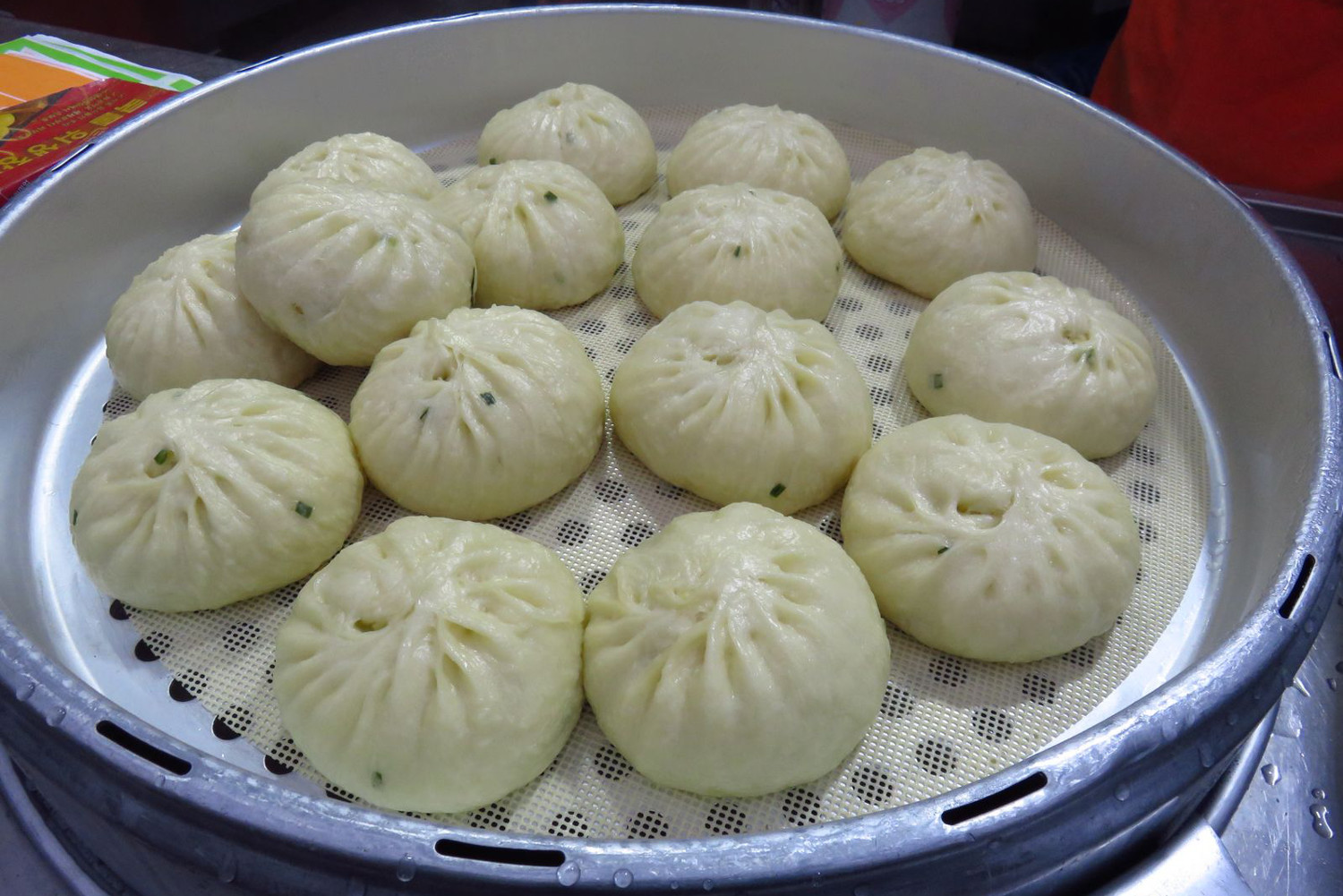 Steamed dumplings are a traditional street snack throughout Korea. Image by Phillip Tang / Lonely Planet