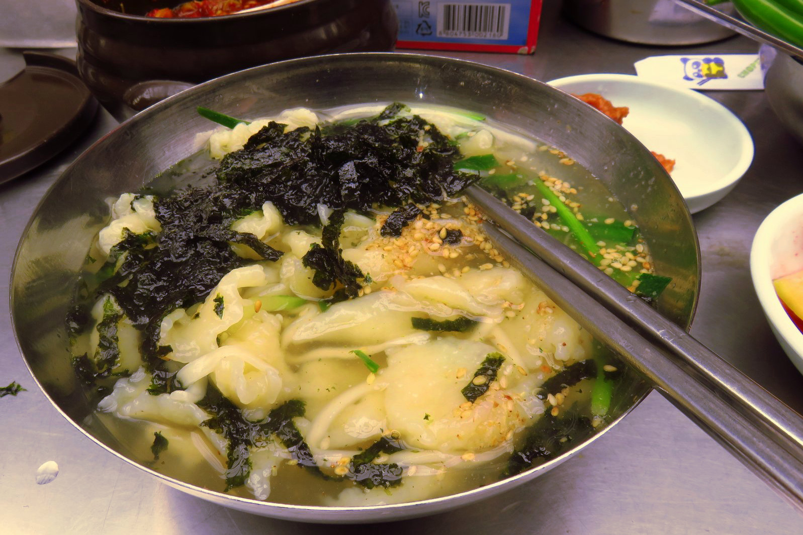 Sujebi are hand-torn noodles served in soup broth. Image by Phillip Tang / Lonely Planet