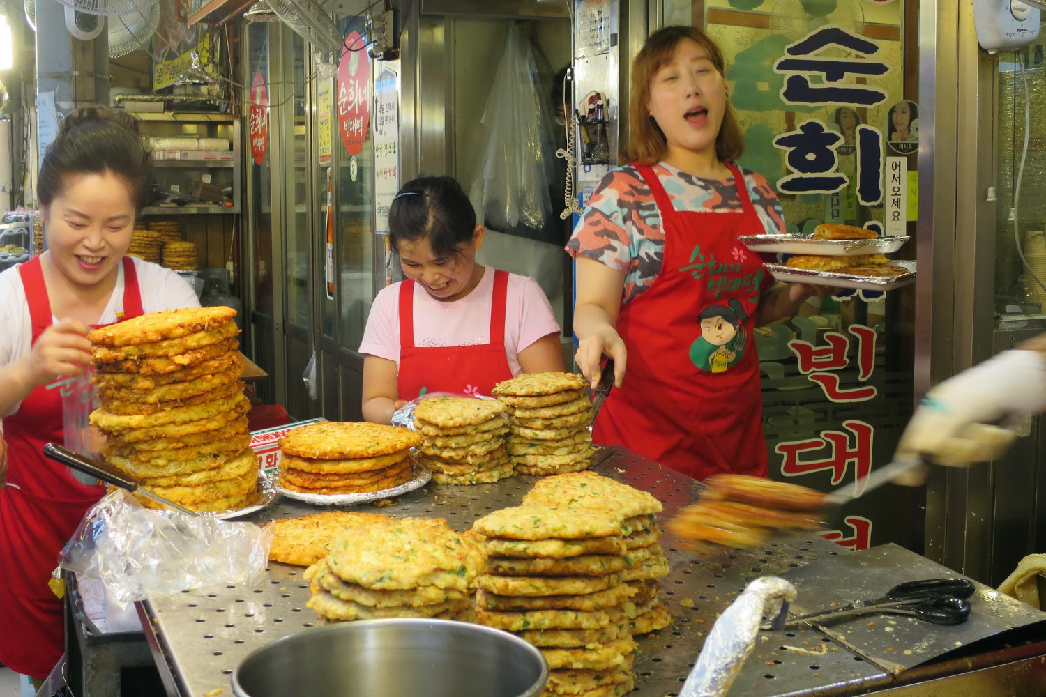 Deep-fried pancakes, known as pajeon, are a favourite Korean snack. Image by Megan Eaves / Lonely Planet