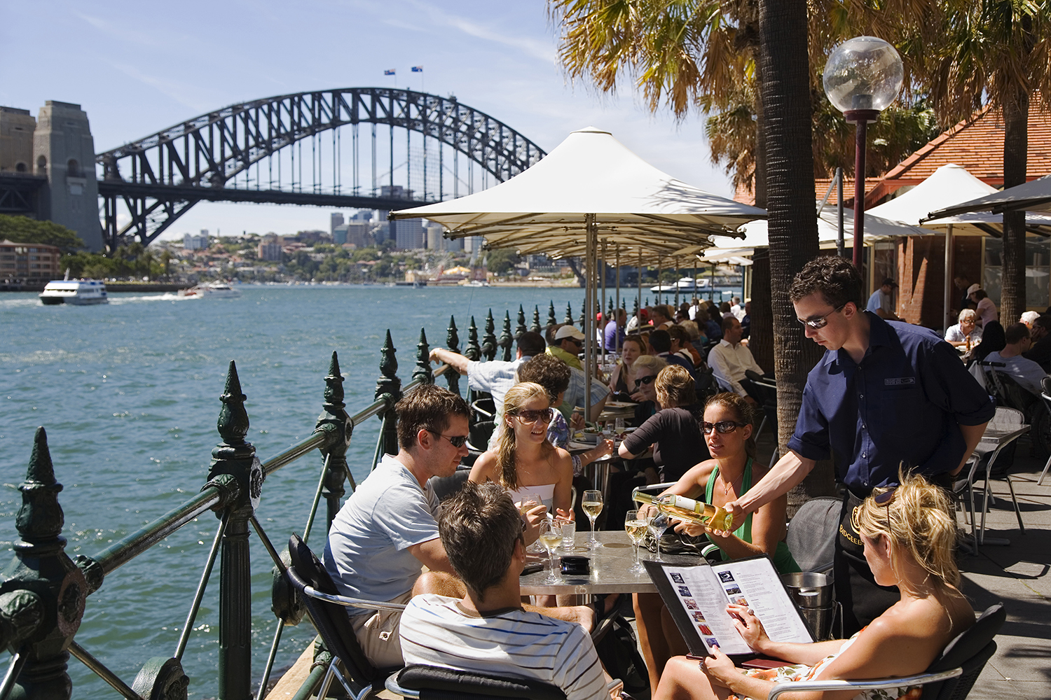 Get the world on your plate with a backdrop of Sydney's most iconic views. Image by Andrew Watson / AWL Images / Getty Images