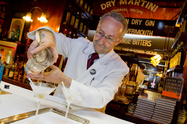 A bar-tender mixes Dry Martini's namesake cocktail. Image by Diego Lezama