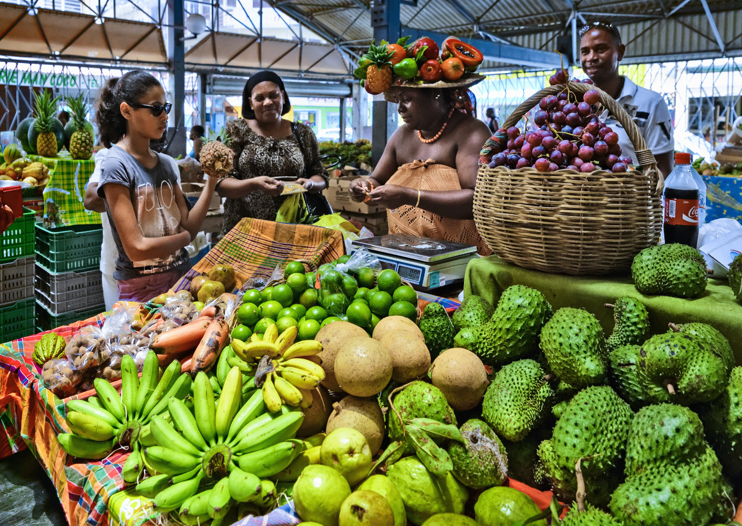 An overflowing stash of locally grown fruits and spices flavors the Caribbean's dishes. Image by Bruno De Hogues / Photo Library / Getty