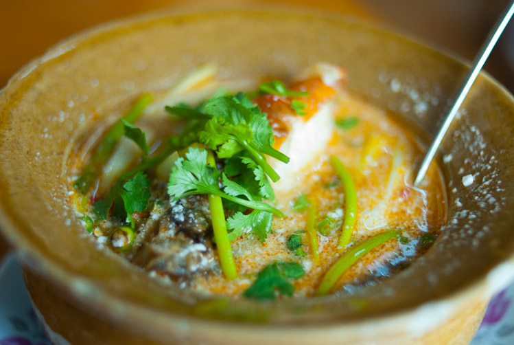 A bowl of tom yam, Thai-style sour, spicy soup, Bangkok. Image by Austin Bush