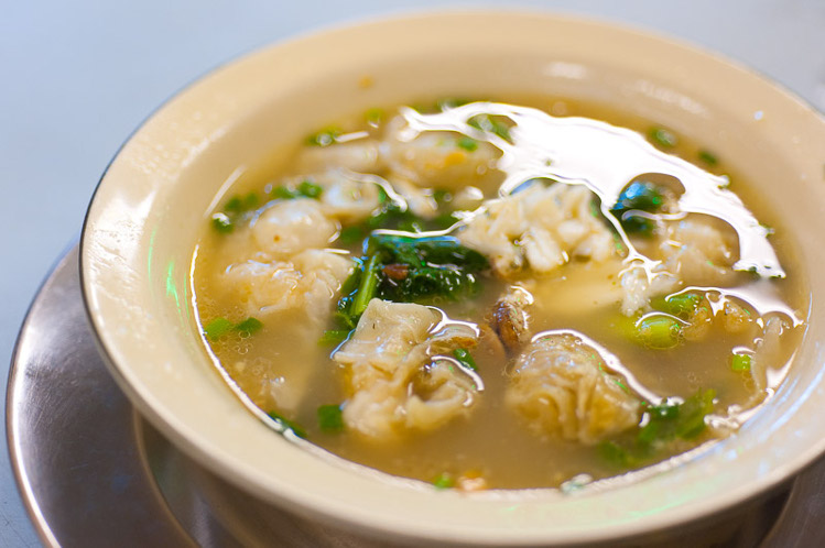 A bowl of Chinese-style noodles, served here with wantons, Bangkok. Image by Austin Bush