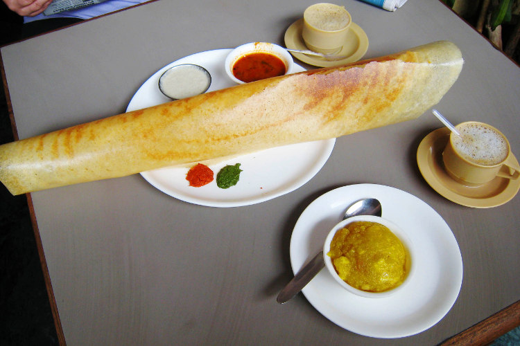 Supersized paper dosa and chai. Image by  Charles Haynes / CC BY-SA 2.0. 