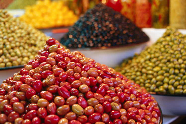Piles of olives can be found on sale in many Moroccan markets. Image by Olivier Cirendini / Lonely Planet Images / Getty 