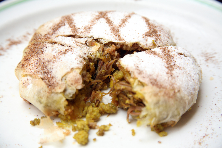 Pick up a pigeon pastilla for a traditional snack. Image by Suzanne Porter /  Dorling Kindersley / Getty