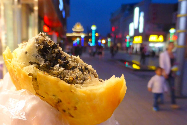 Black sesame shaobing. Image by Phillip Tang / Lonely Planet