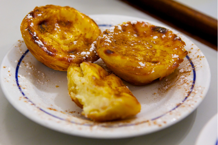 Lisbon's famous pastéis de nata (custard tart), as served by Antiga Confeitaria de Belém. Image by Matthew Hine / CC by 2.0