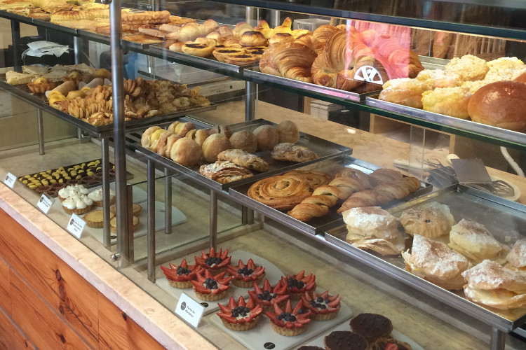 A mouth-watering display of sweet things at Tartine. Image by Hannah Summers / Lonely Planet