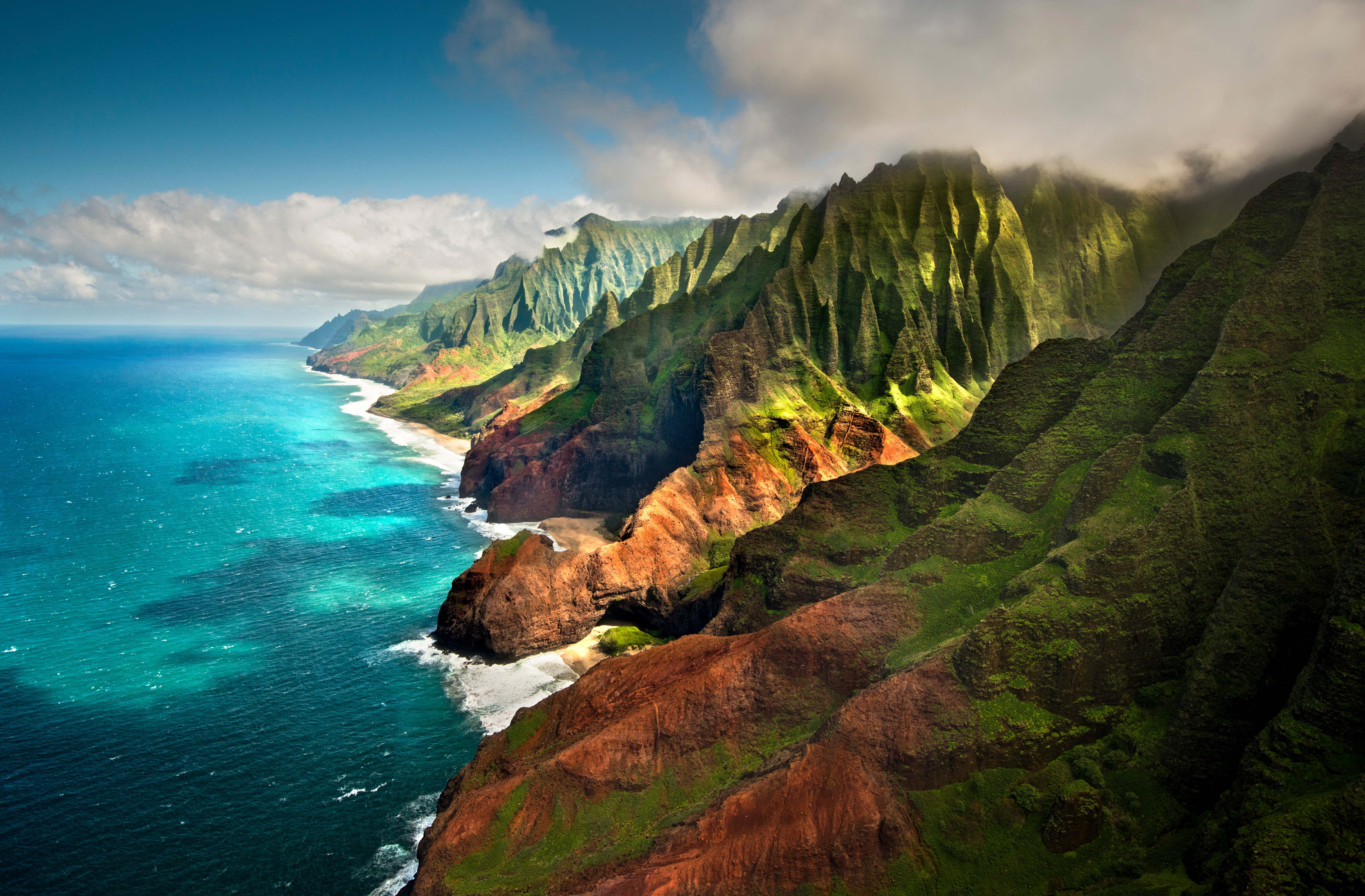 The rugged cliffs of the Na Pali Coast. Image by Cultura RM/George Karbus Photography / Getty