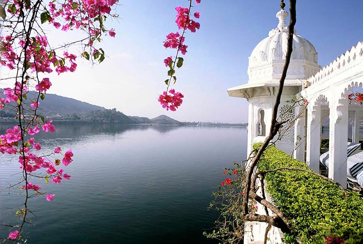 A hotel on its very own island - enjoy the grandeur and seclusion of the Lake Palace Hotel to woo your would-be spouse. Image by Chris Caldicott / Axiom Photographic Agency / Getty Images