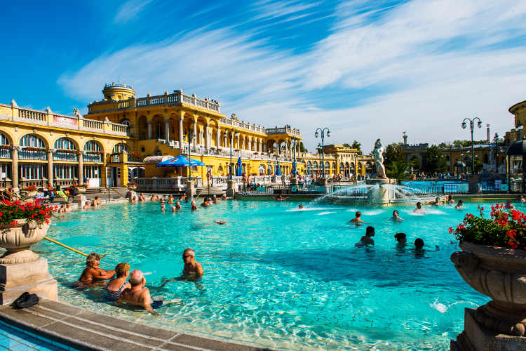 Outdoor pool at Széchenyi Baths. Image by Will Sanders / Lonely Planet