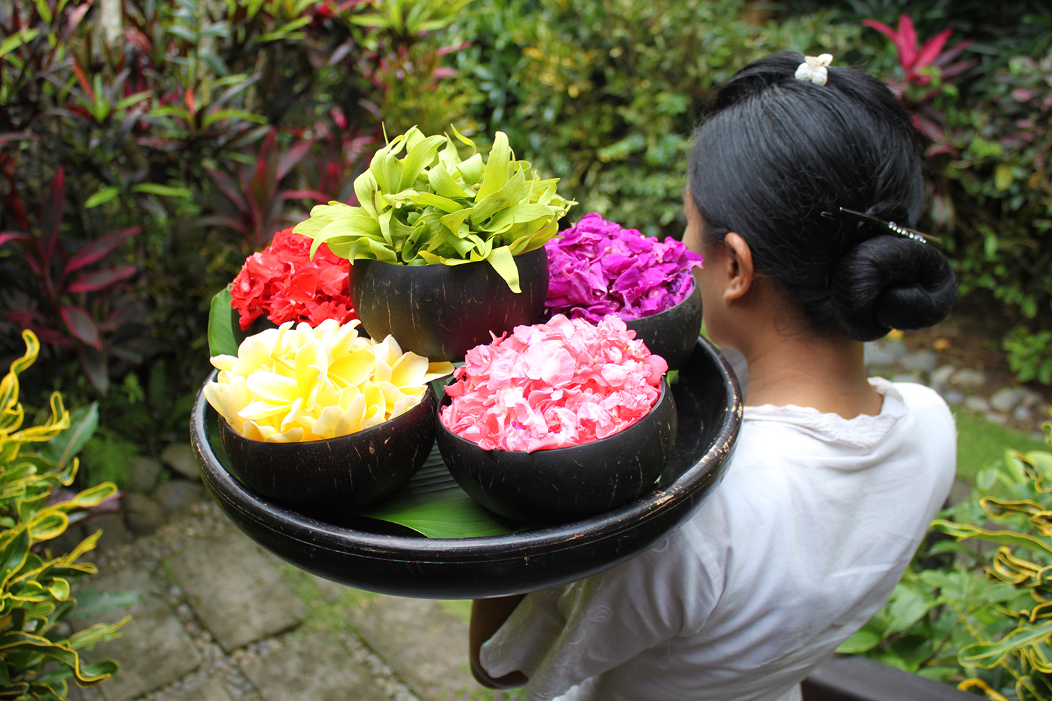 Floral arrangement at a spa in Bali, a sure sign of pampering ahead. Image by Samantha Chalker / Lonely Planet