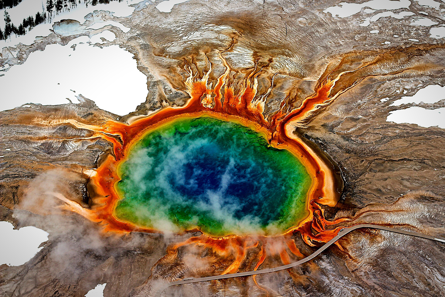 An aerial view of the jewel-like Grand Prismatic Spring in Yellowstone National Park © Marie-Louise Mandl / EyeEm / Getty Images