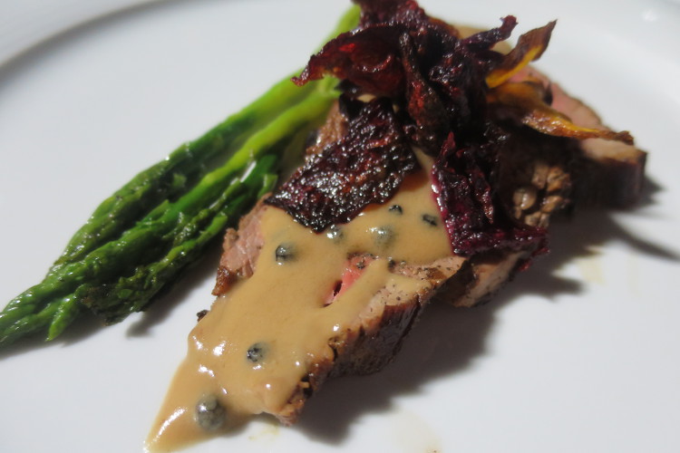 Tagliata with truffle sauce, asparagus and beetroot chips at Wine Art Estate’s wine-matching dinner for Dramoinognosia. Image by Karyn Noble / Lonely Planet