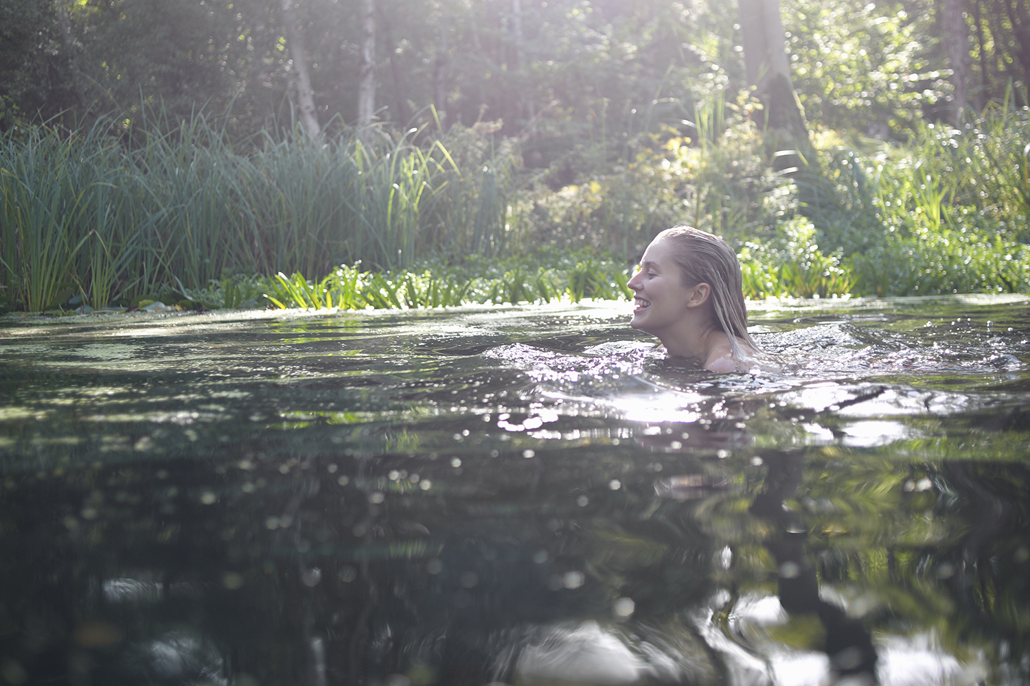 Take the plunge and join a growing global community of wild swimmers. Image by Dougal Waters / Digital Vision / Getty Images