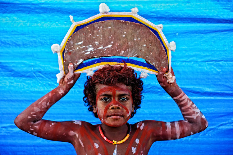 Boy dressed up for Mowanjum Festival in the Kimberley region. Image by Ingetje Tadros / The Image Bank / Getty Images