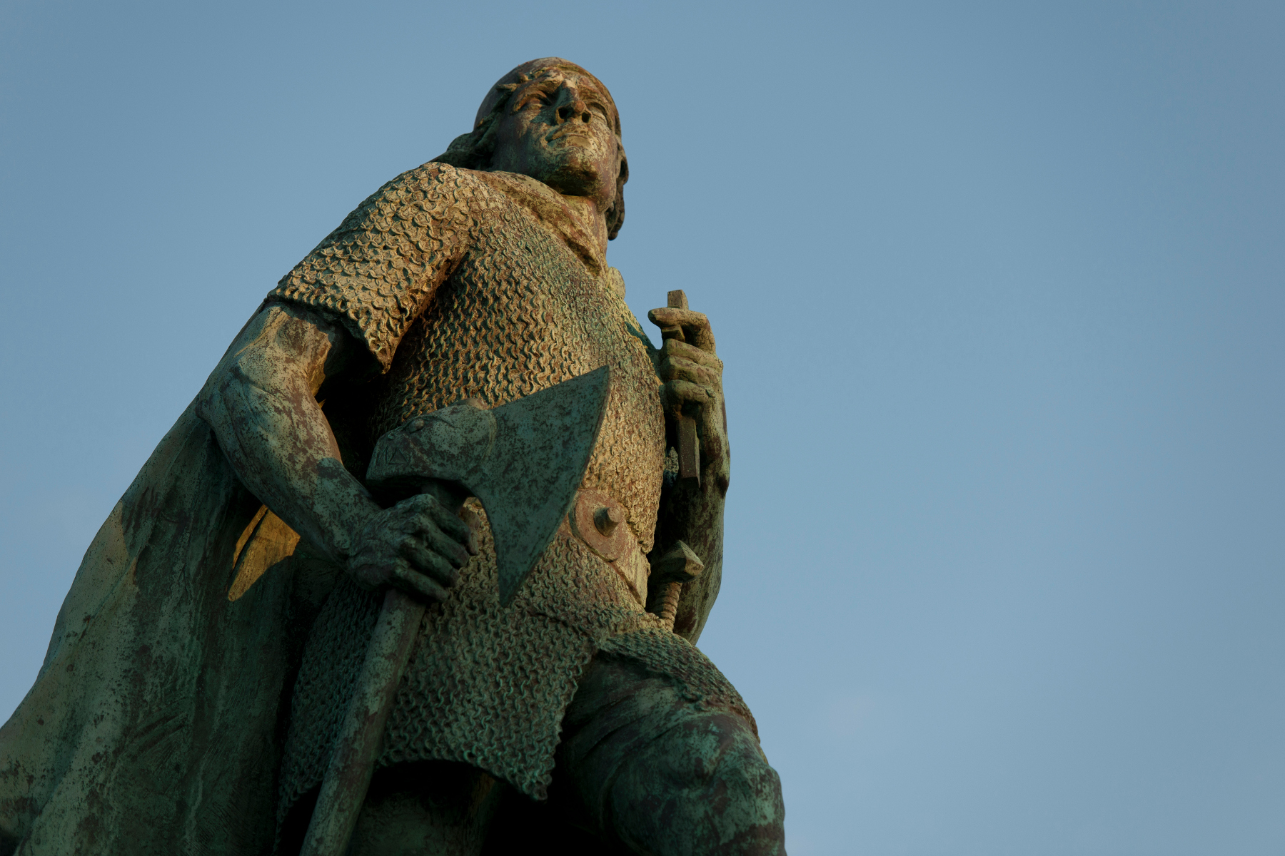 Leifur Eiríksson's statue stands tall outside Reykjavík's Hallgrímskirkja church. Image by Keith Levit Photography / Photolibrary / Getty