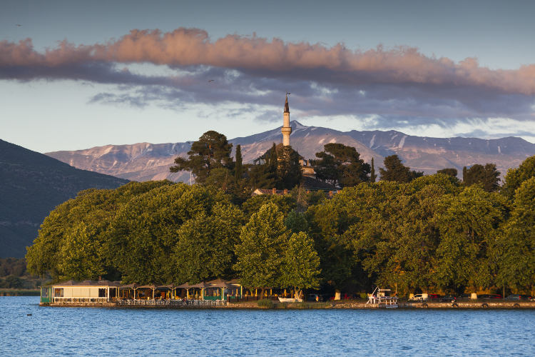 The Ethnographic Museum, former mosque, on Lake Pamvotis. Image by Walter Bibikow / Getty Images