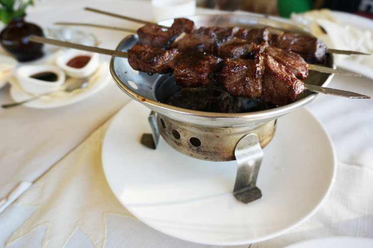 Lamb dish at Pashmir restaurant in Kazan. Image by Anita Isalska / Lonely Planet