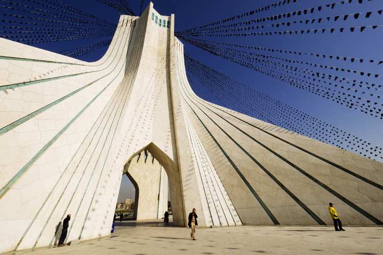 The Azadi Tower marks the west entrance of Tehran. Image by Amos Chapple / Lonely Planet Images / Getty