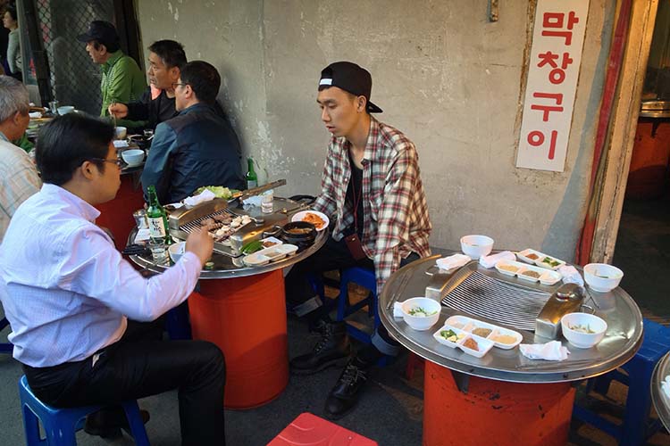 Diners in an alleyway restaurant in Insadong. Image by Tim Richards / Lonely Planet