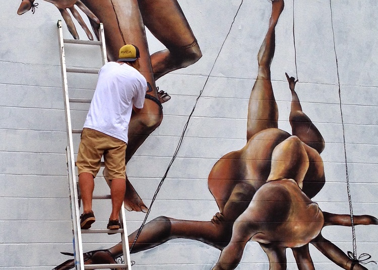Mural being created for the Pow Wow Hawaii festival. Image by Tim Richards / Lonely Planet