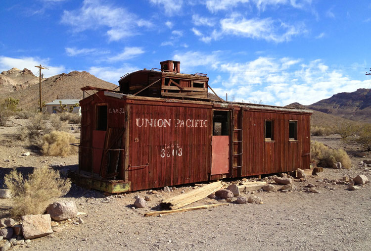 Abandoned old railway carriage in the ghost town of Rhyolite. Image by Tim Richards / Lonely Planet