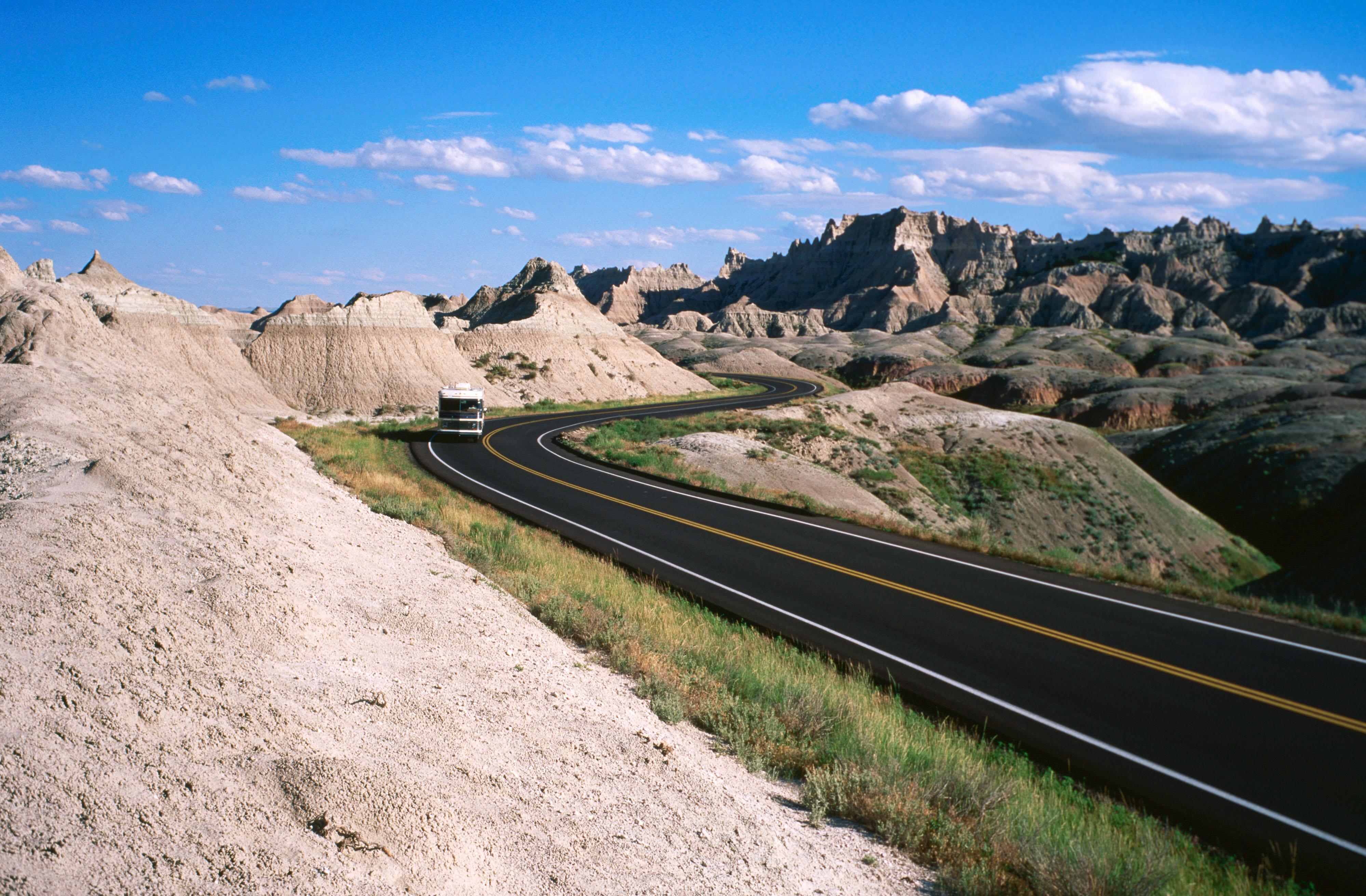 A road through Badlands National Park. Image by Holger Leue / Lonely Planet Images / Getty