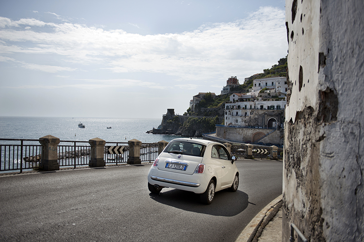 A nimble Fiat Cinquecento is the perfect drive for narrow corniche roads. Image by Mark Avellino / Lonely Planet Images / Getty Images
