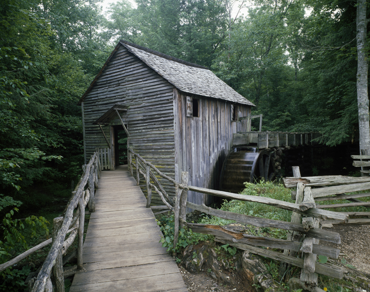 Exploring Cades Cove may turn up a gristmill in a forest. Image by Vernon Sigl / SuperStock / Getty Images.