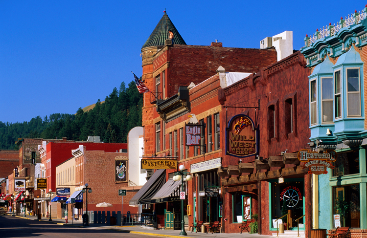 "No law at all in Deadwood, is that true?" - so began the iconic HBO TV series. This is the main street in Deadwood. Image by John Elk III / Lonely Planet Images / Getty Images.