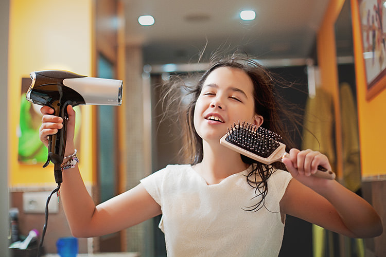 Be tousled on your travels and leave the hairdryer at home. Image by Carol Yepes / Moment / Getty Images