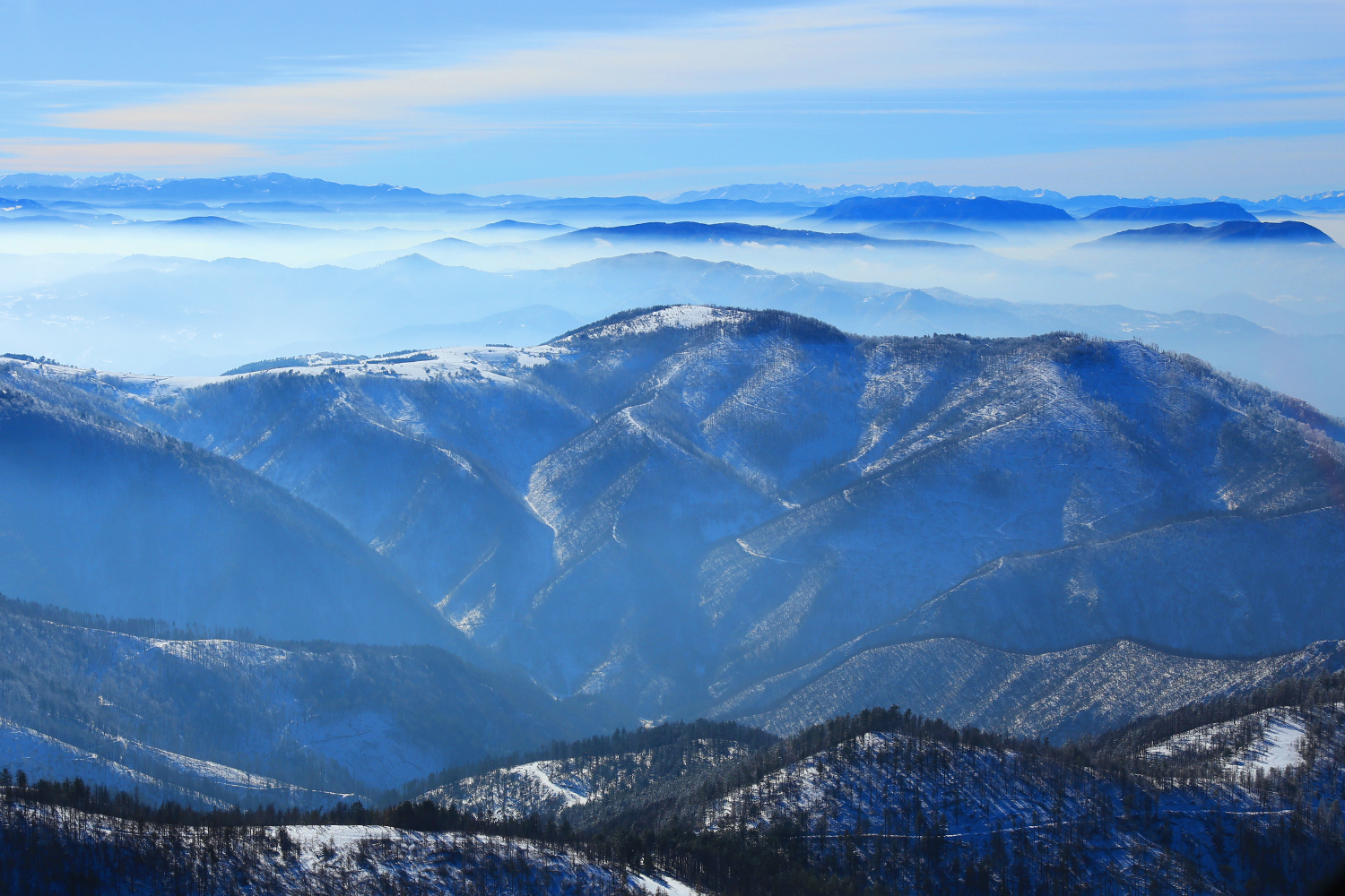 Helicopter views of western Serbia’s snow-laden mountains © Anisha Shah / Lonely Planet