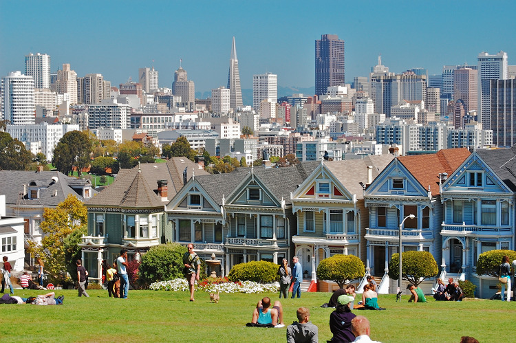 Wish you were here? The Victorian 'Painted Lady houses in Alamo Square and the San Francisco skyline. Image by David McSpadden. CC BY 2.0
