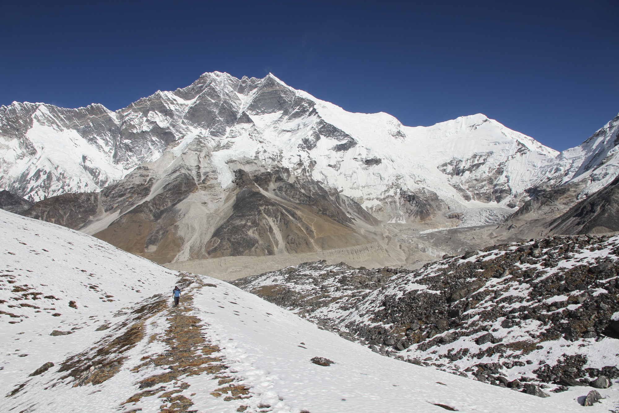 The sheer mountain wall of the Amphu Laptsa Pass. Image by Bradley Mayhew / Lonely Planet