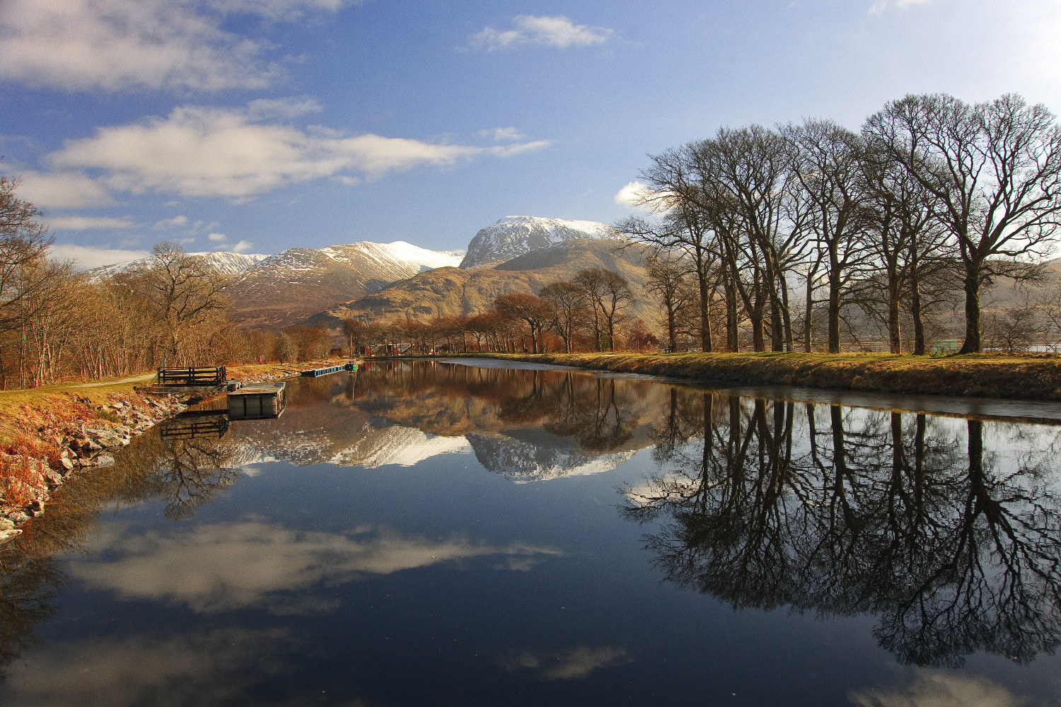 Ben Nevis reflected in the Caledonian Canal. Image by Universal Images Group / Getty
