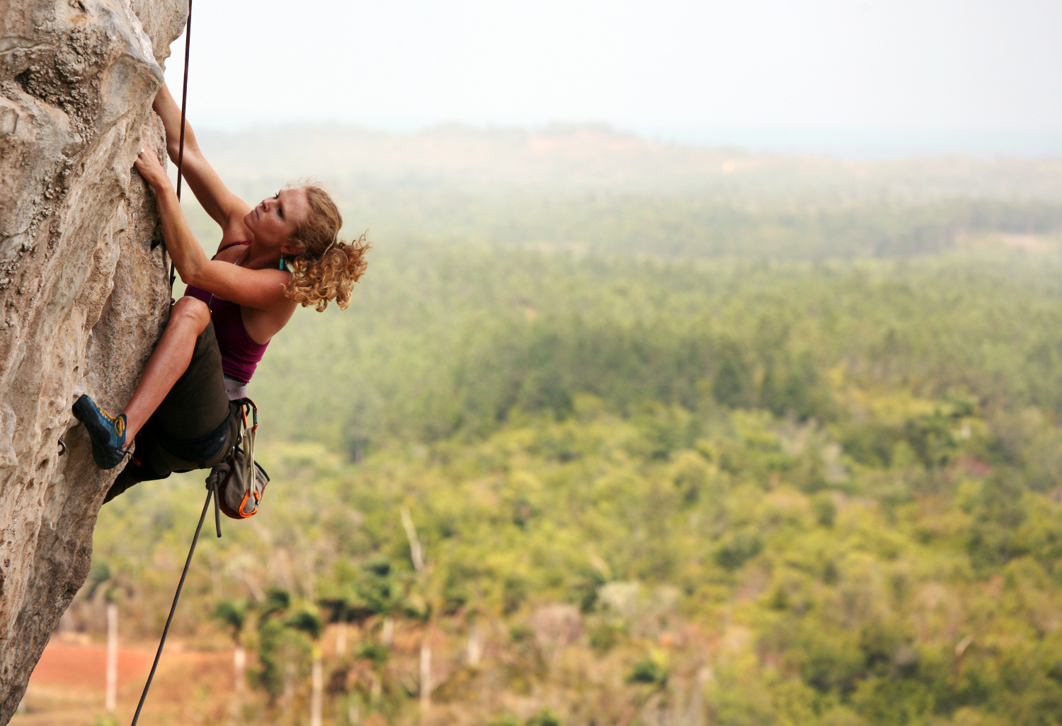 Daredevil rock climbers make a beeline for Viñales' precipitous mogote mountains. Image by Holly Wilmeth / Stone / Getty