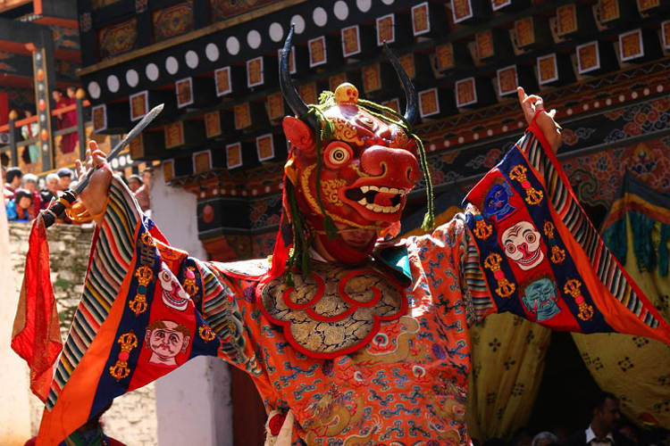 A dancer dressed as Shinje, Lord of Death, Paro, Bhutan. Image by Jean-Marie Hullot / CC by-SA.