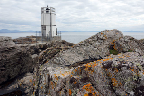 A lighthouse on the west coast of Sleat. Image by James Kay / Lonely Planet